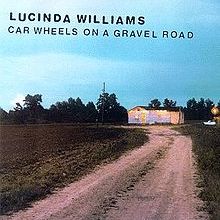 Car Wheels On A Gravel Road